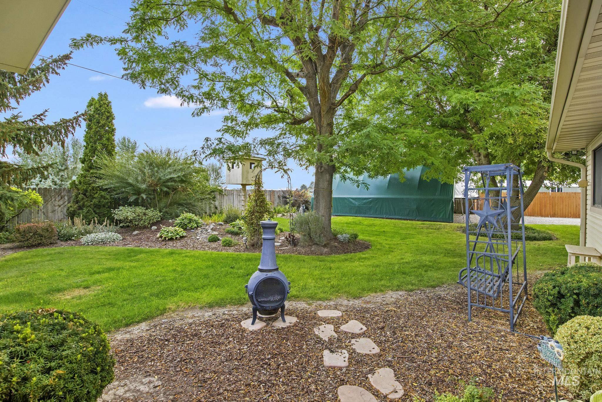 View of fenced backyard