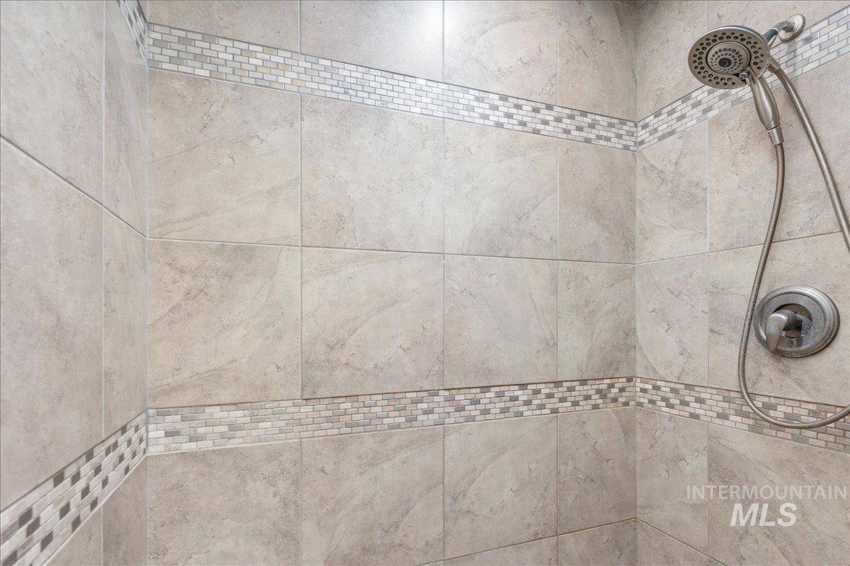 Bathroom view of tiled shower
