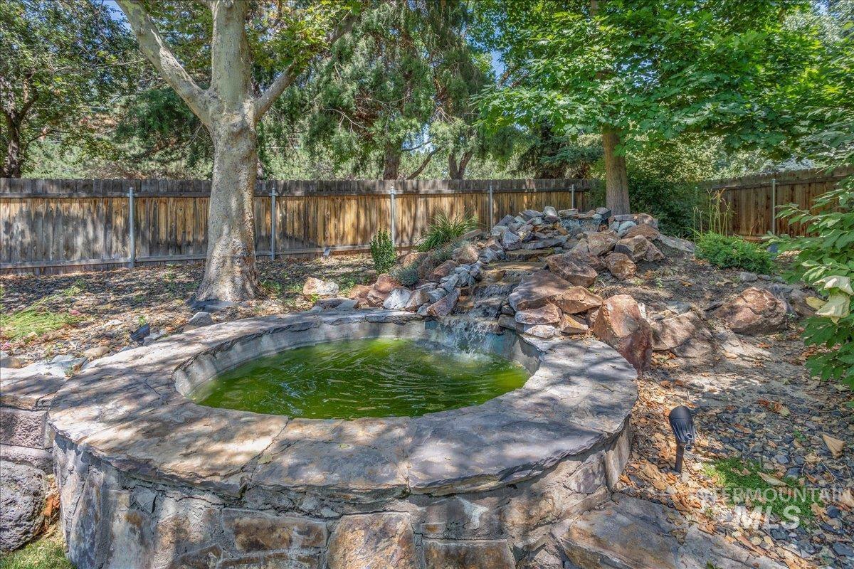 View of fenced backyard