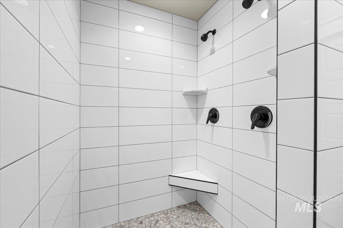 Bathroom with tiled shower