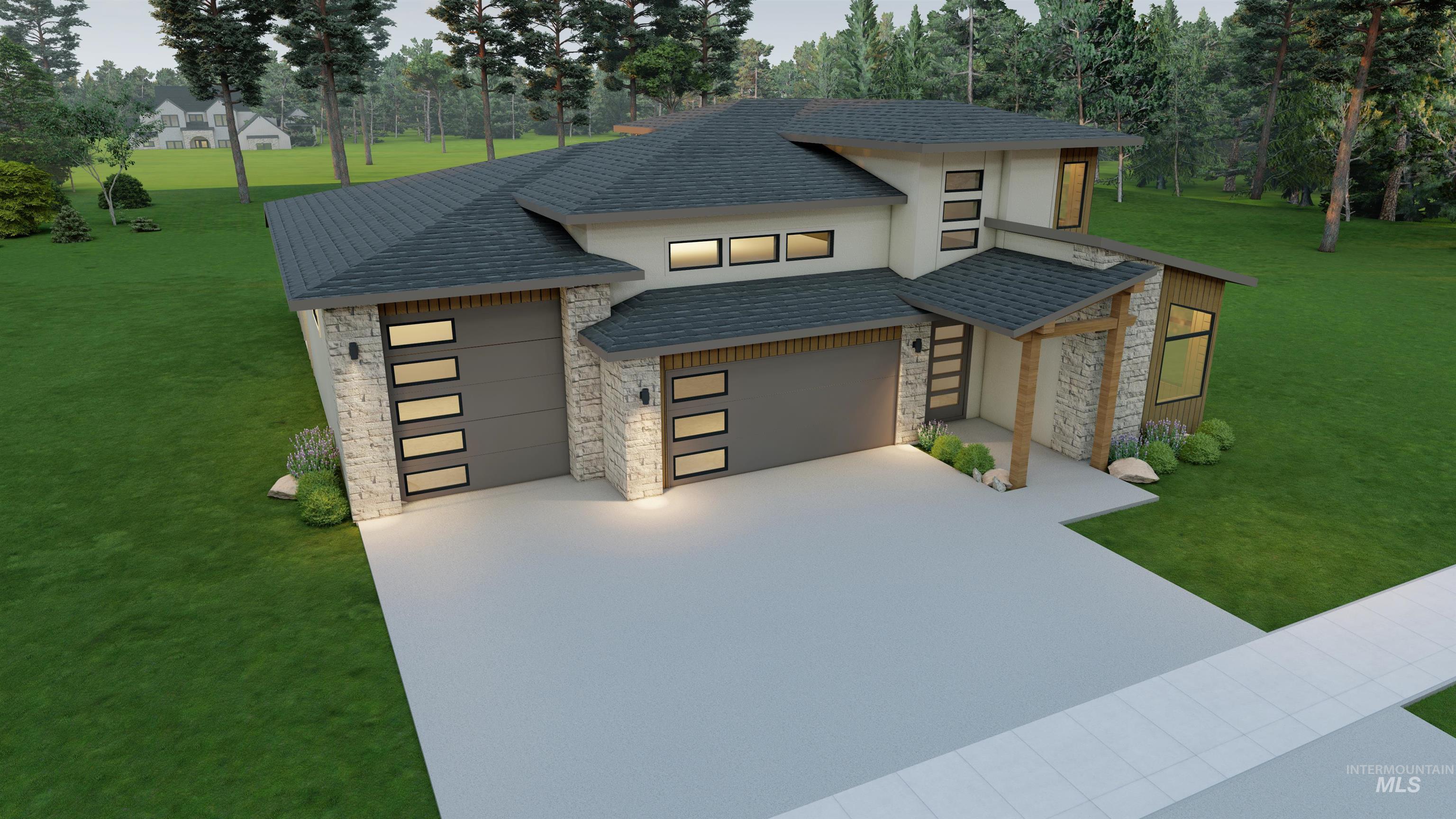 View of front of house featuring stone siding, a front lawn, and a garage