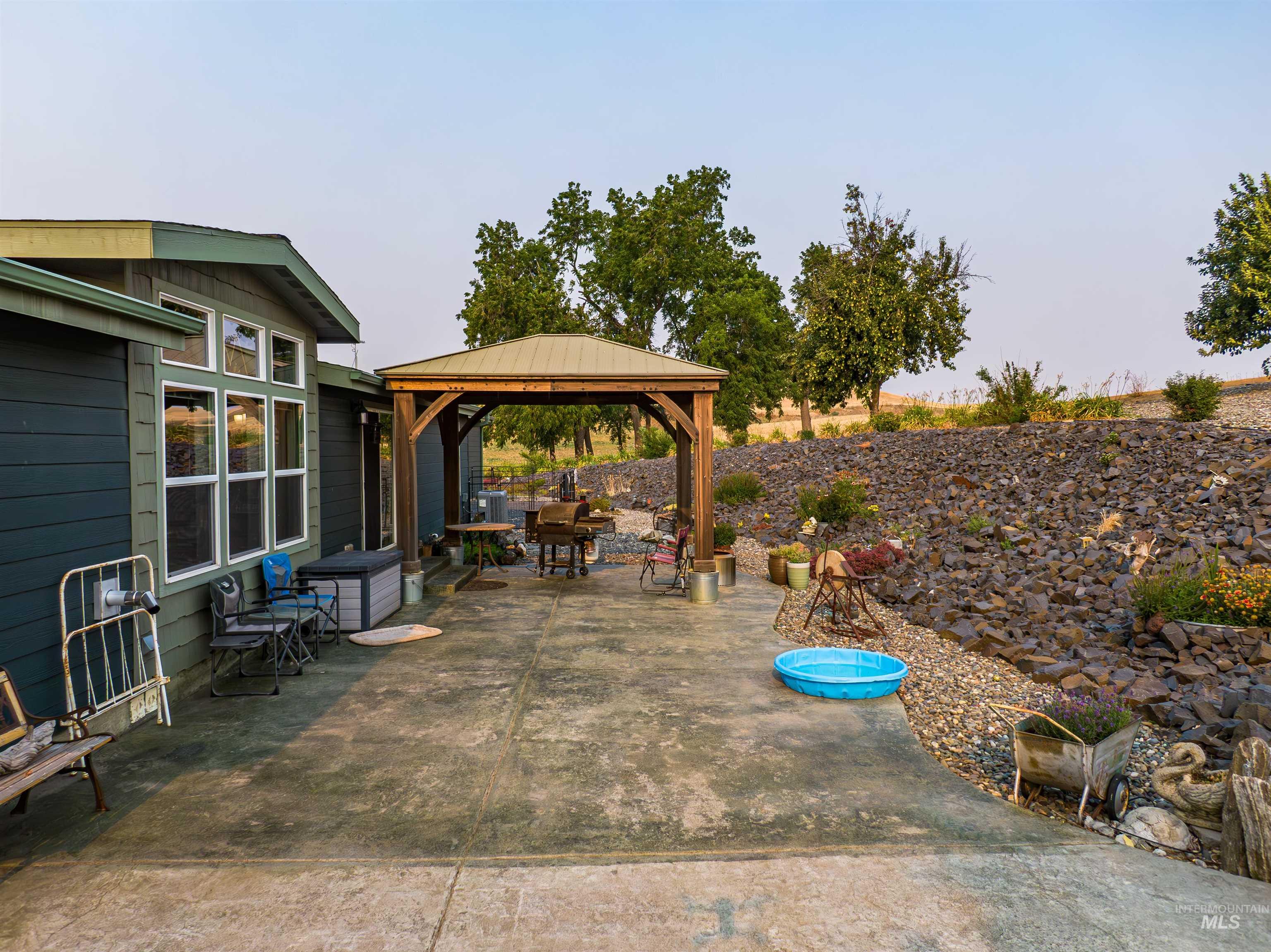 View of patio with a gazebo