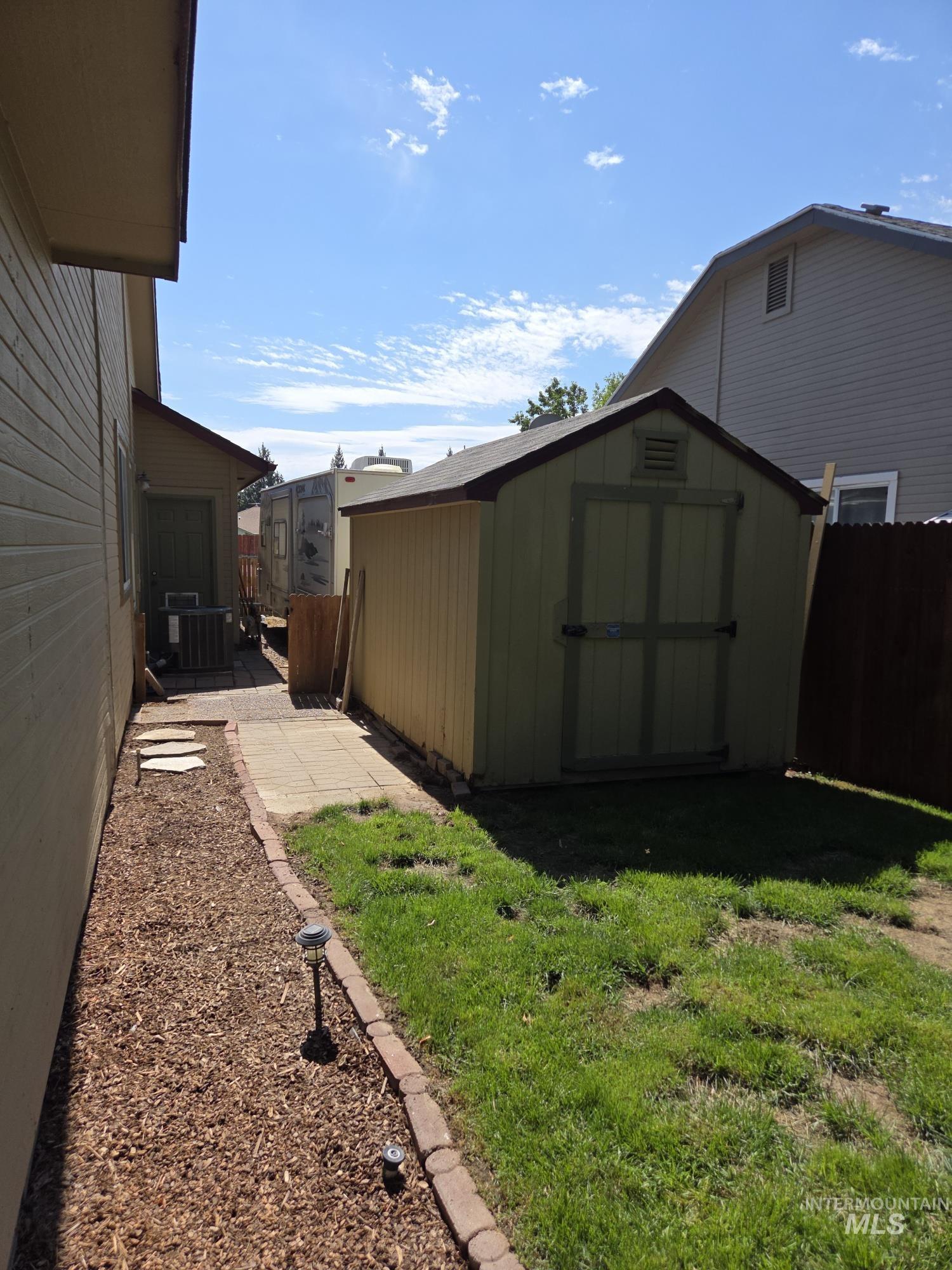 View of shed and RV parking