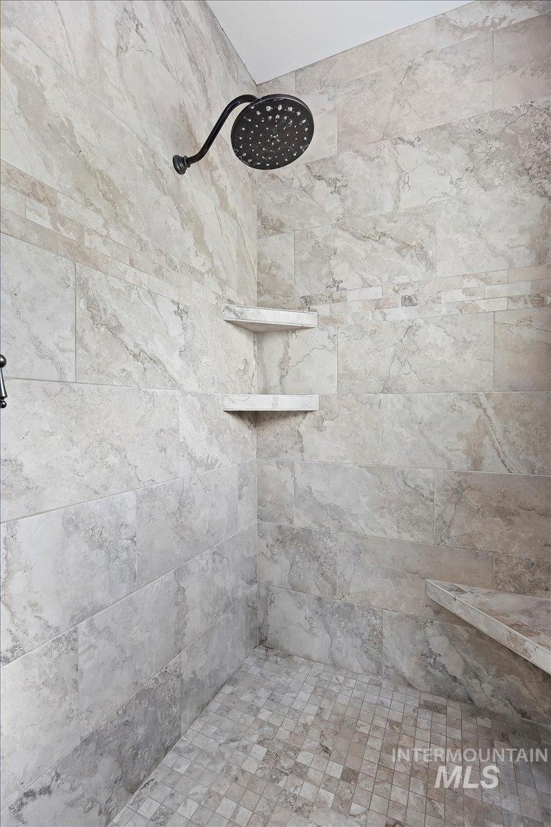 Bathroom view of tiled shower