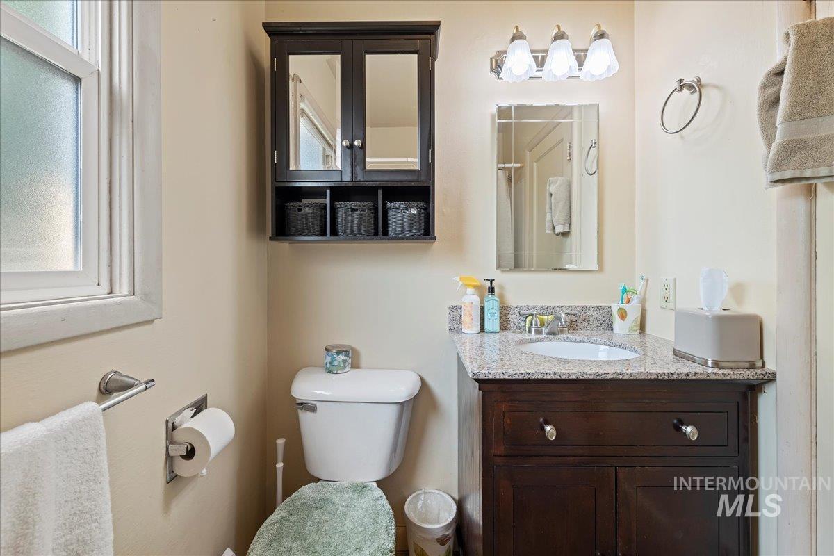 Bathroom with toilet and vanity
