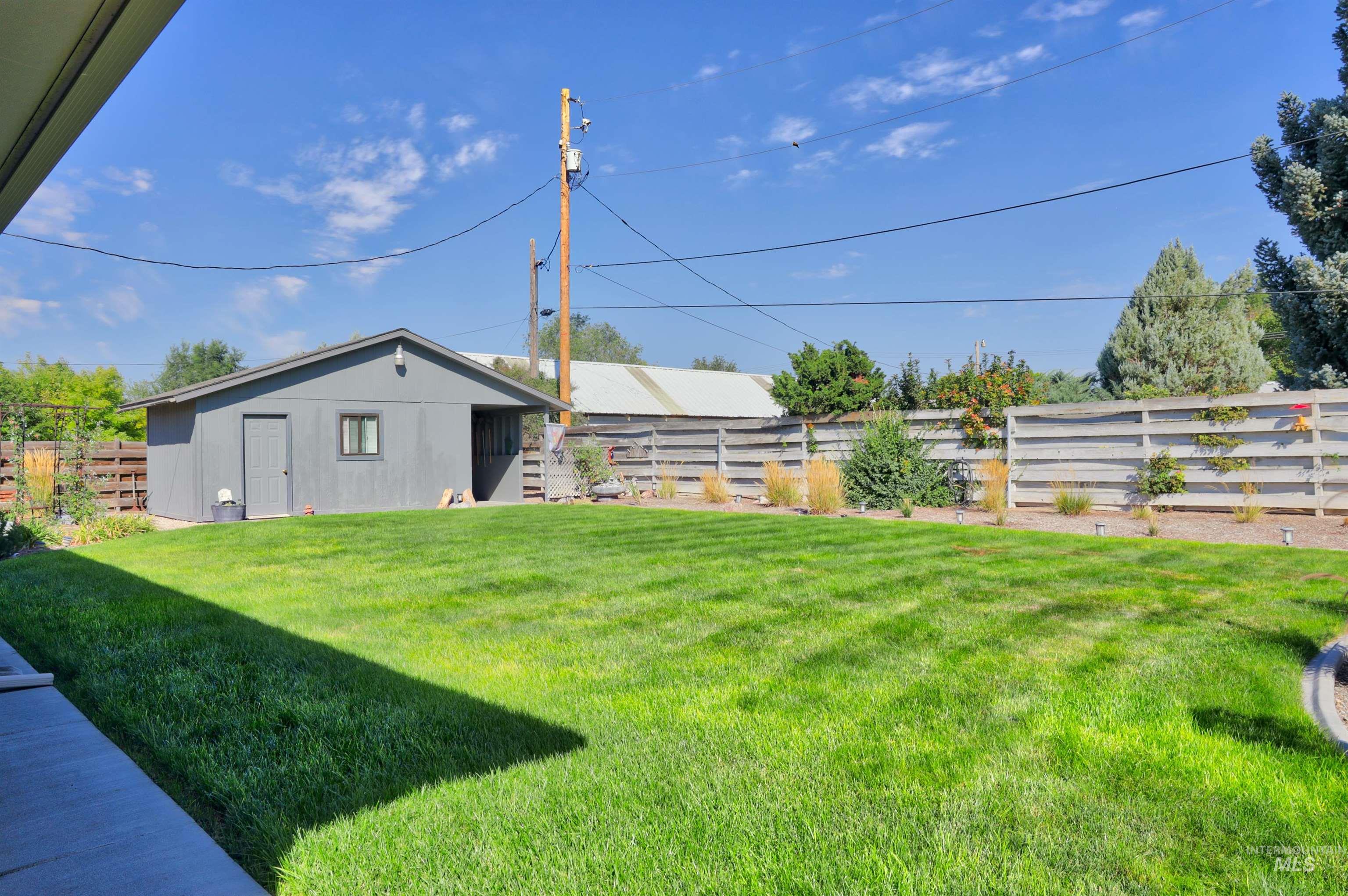 View of fenced backyard