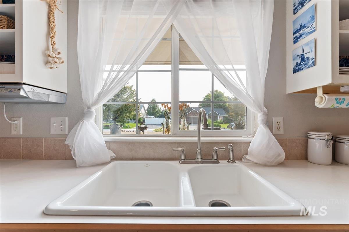 Kitchen view of light countertops