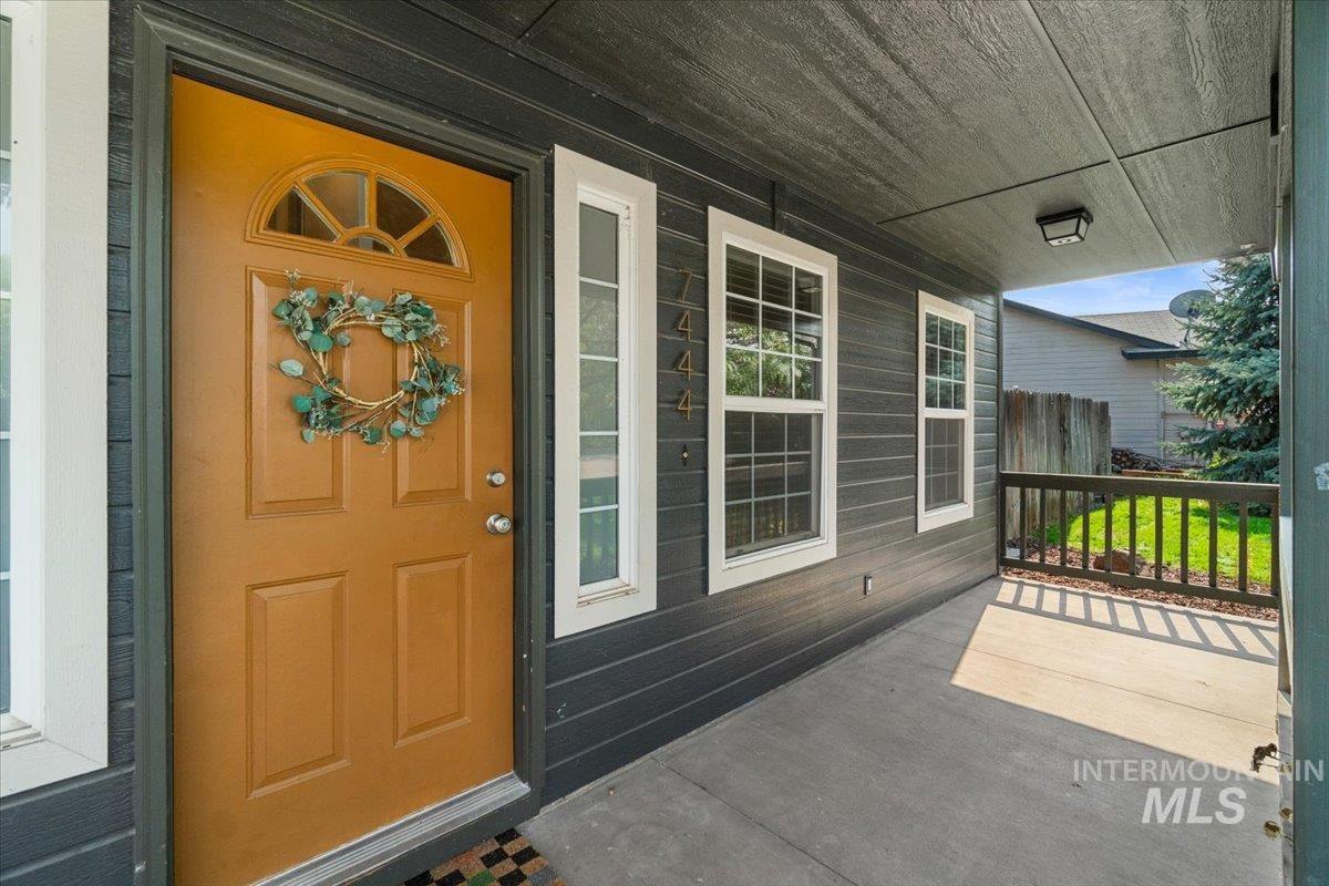 Property entrance featuring a porch