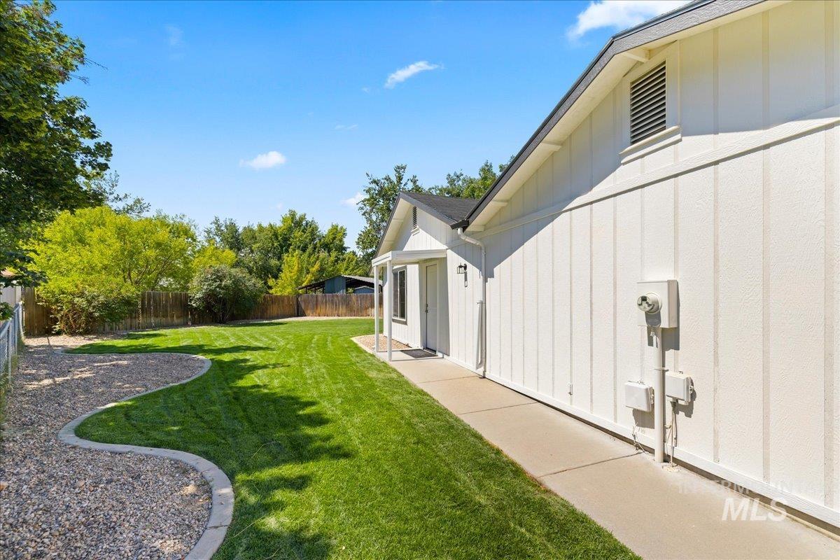 View of fenced backyard