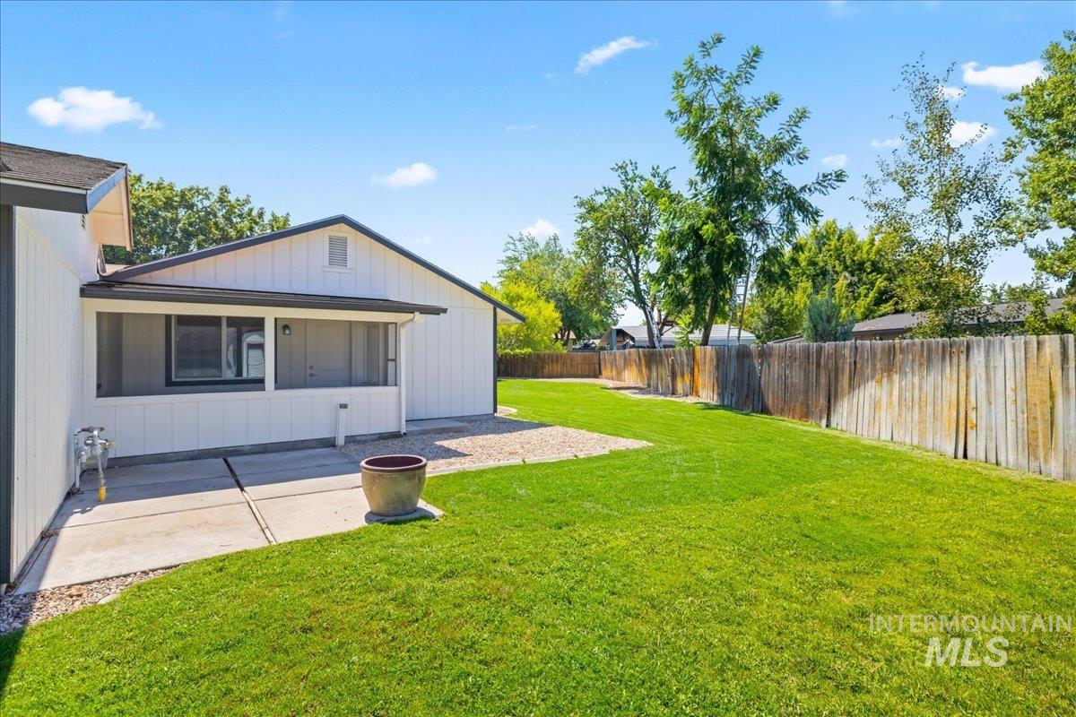 View of fenced backyard