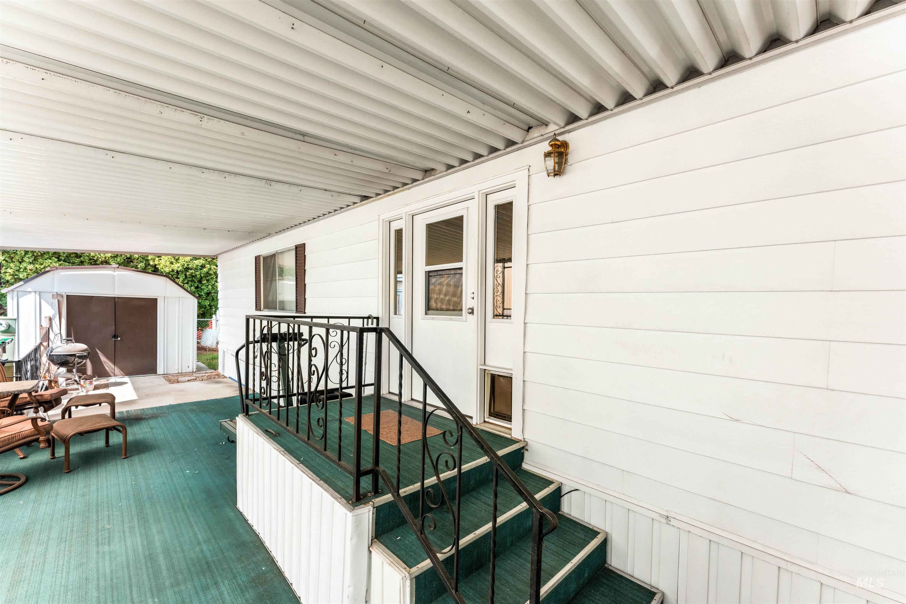 Wooden terrace with a shed