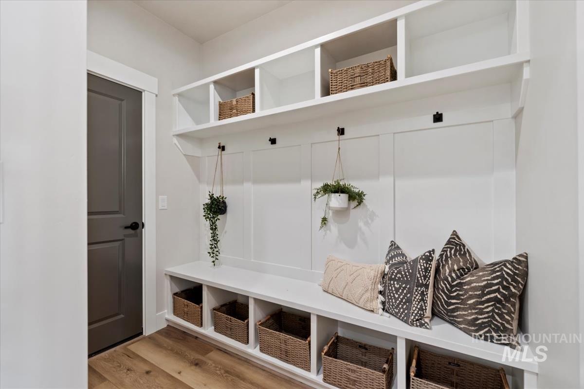 Mudroom with light wood-style floors