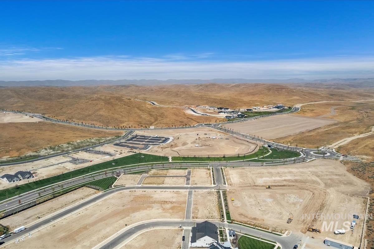 Aerial overview of property's location featuring mountains