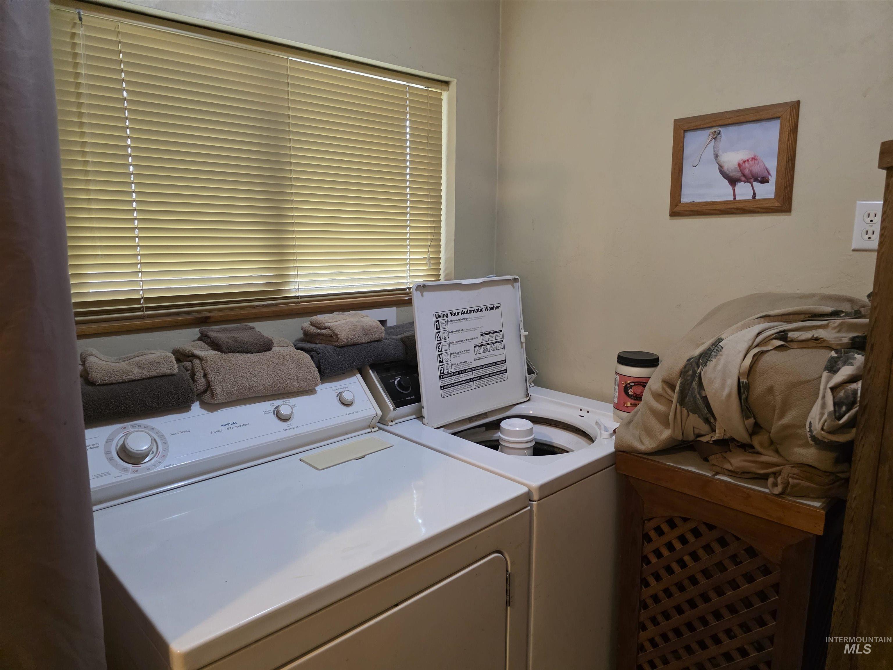 Washroom with separate washer and dryer