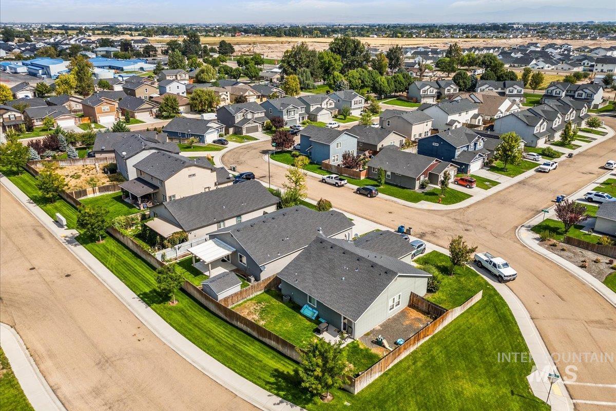 View of property location with nearby suburban area