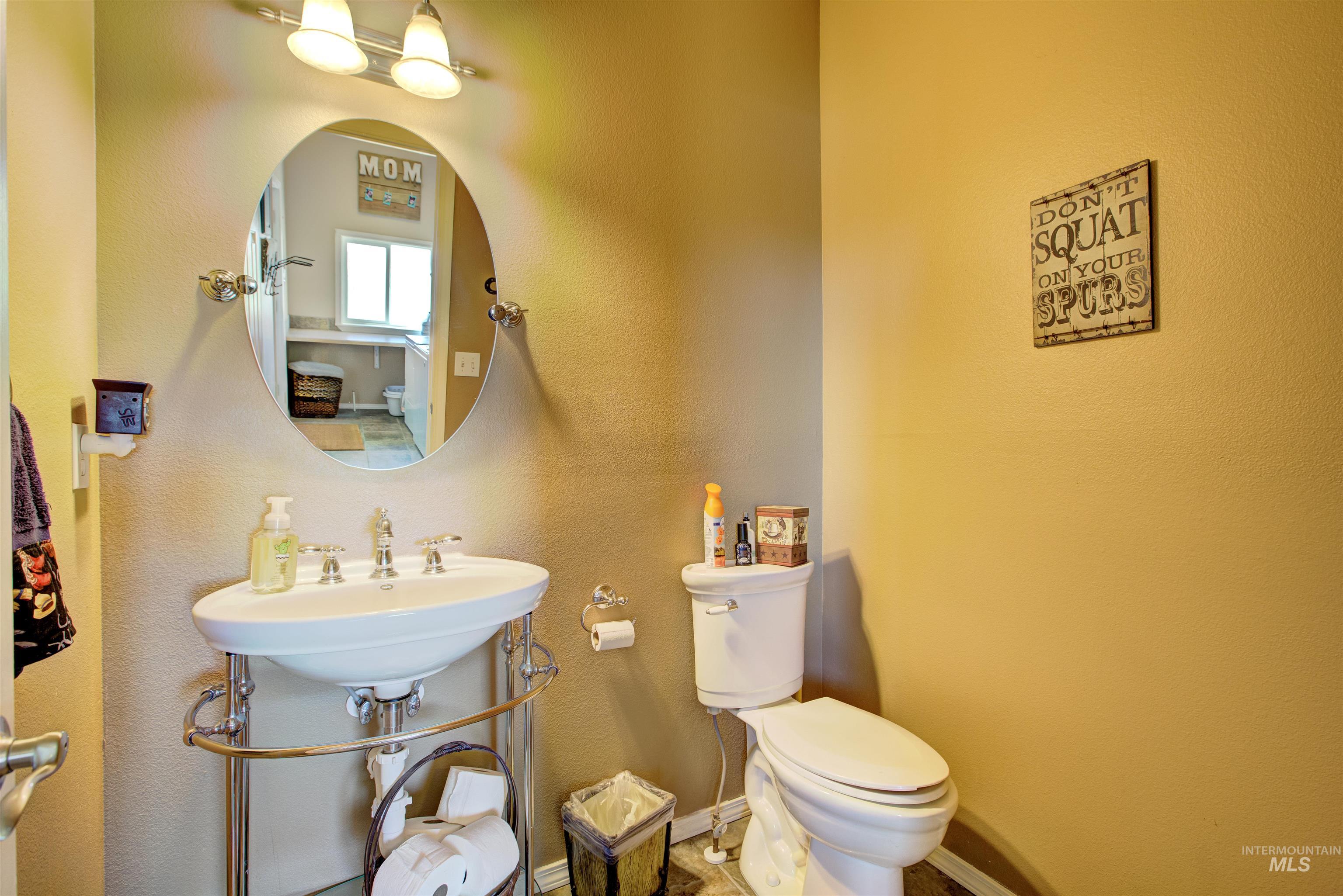 Bathroom featuring a textured wall