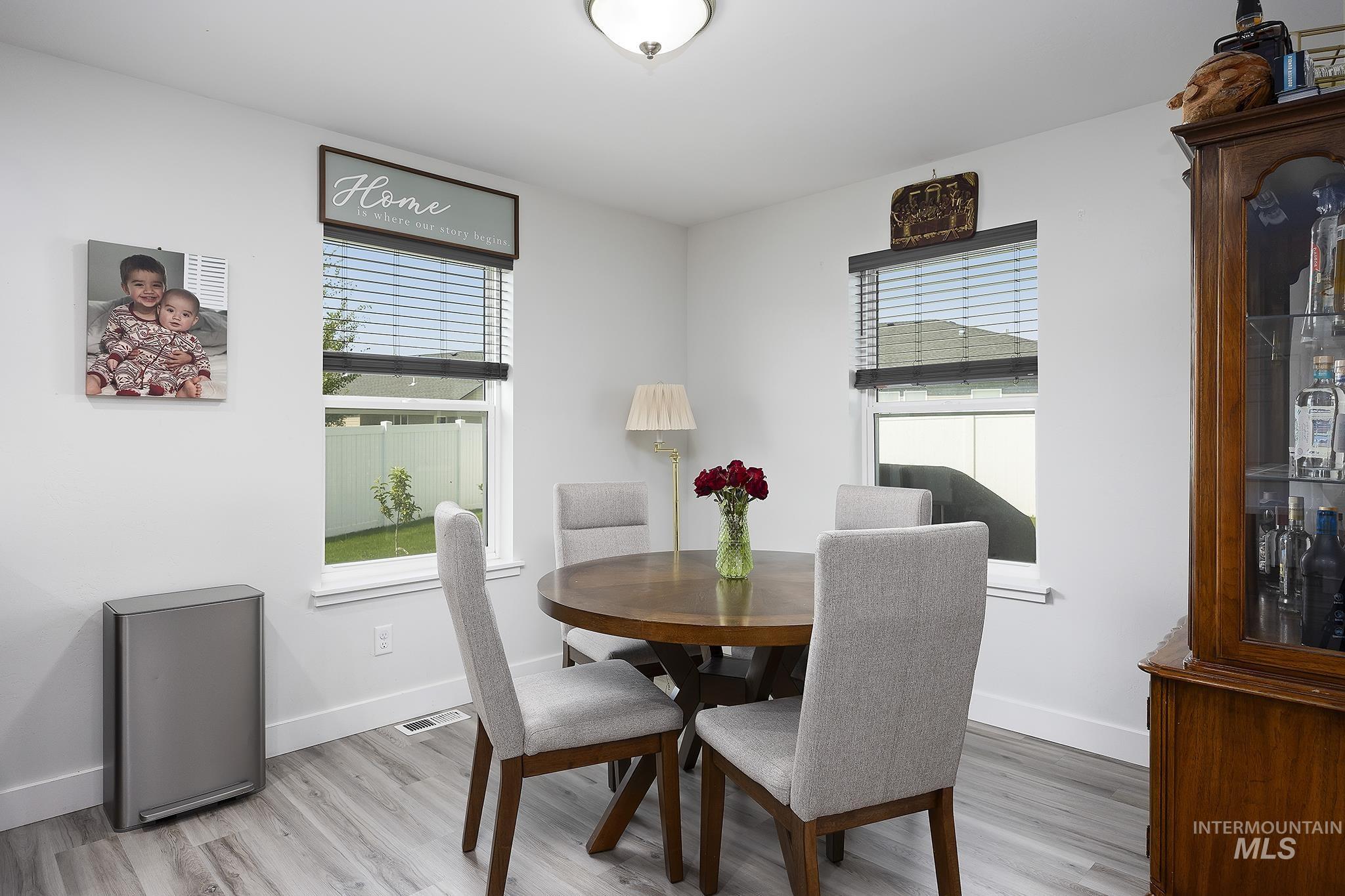 Dining space featuring plenty of natural light and light wood-type flooring