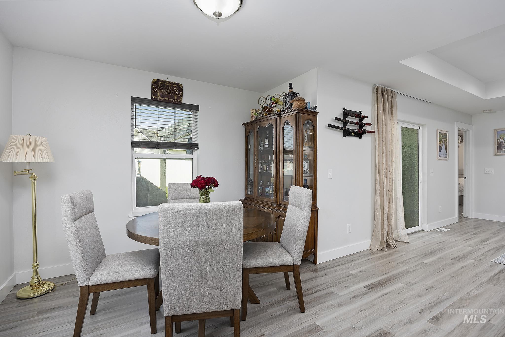 Dining room featuring light wood-style floors