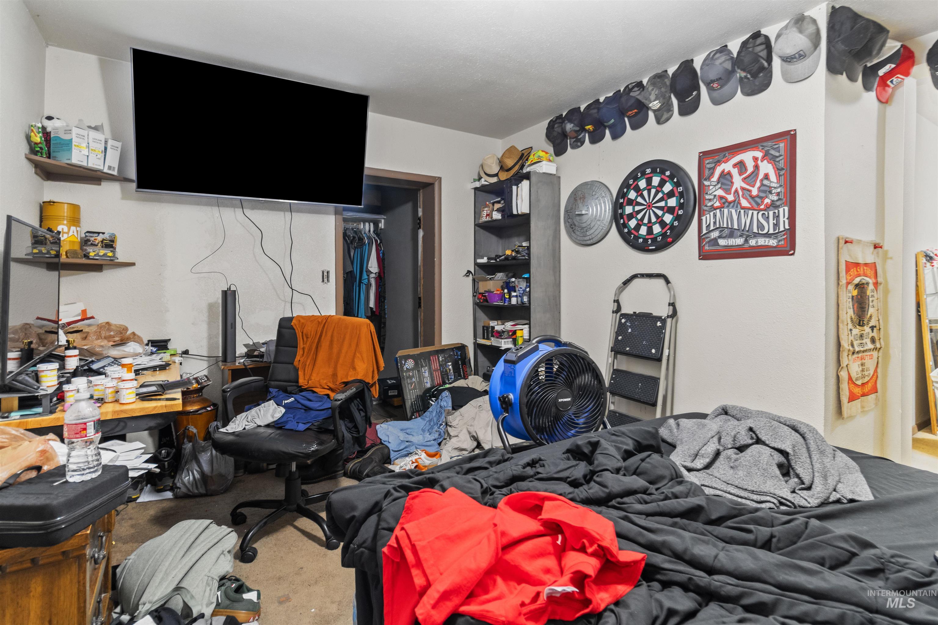 Bedroom featuring an office area