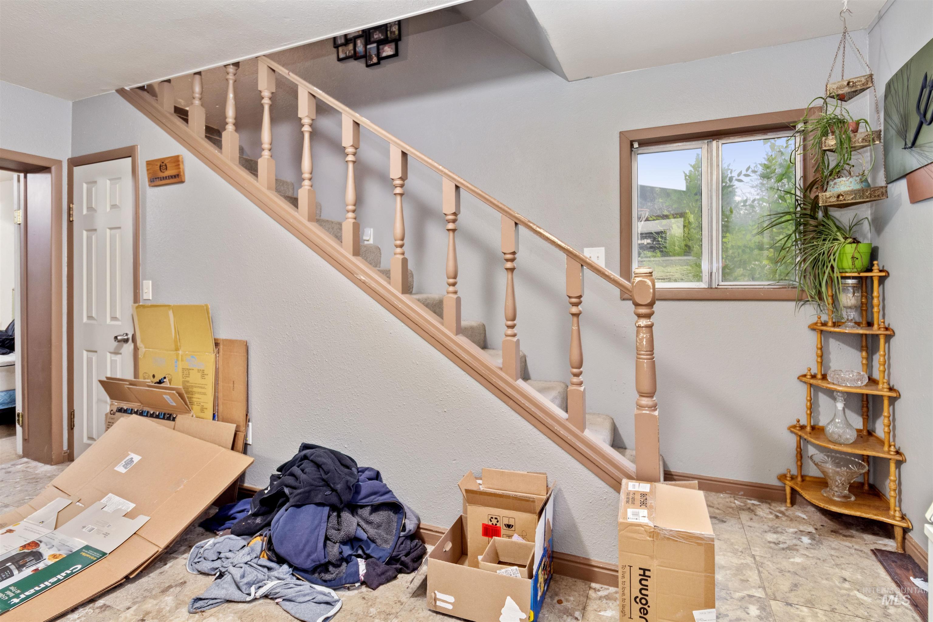 Stairs featuring baseboards