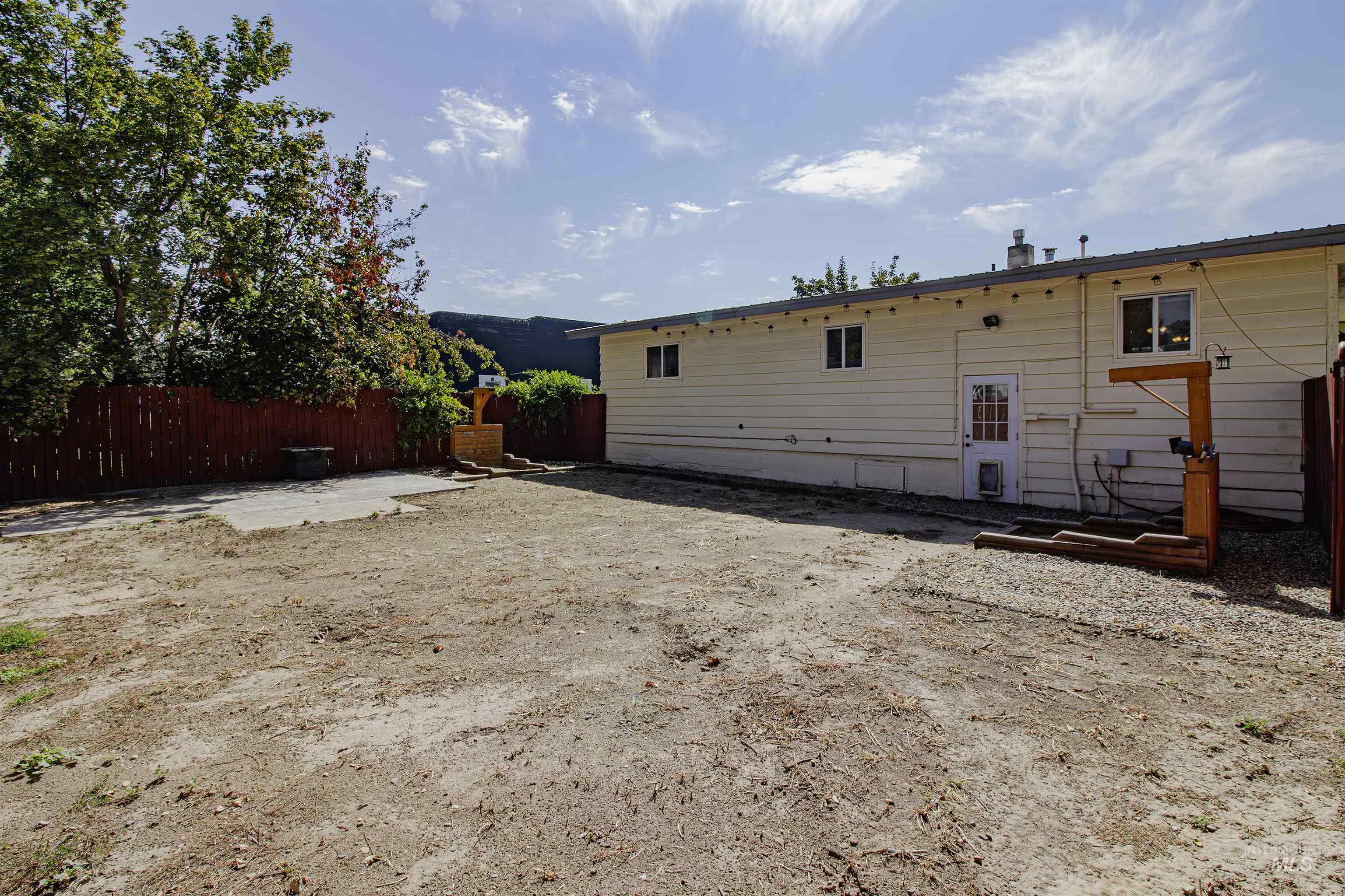 Rear view of house with a patio area