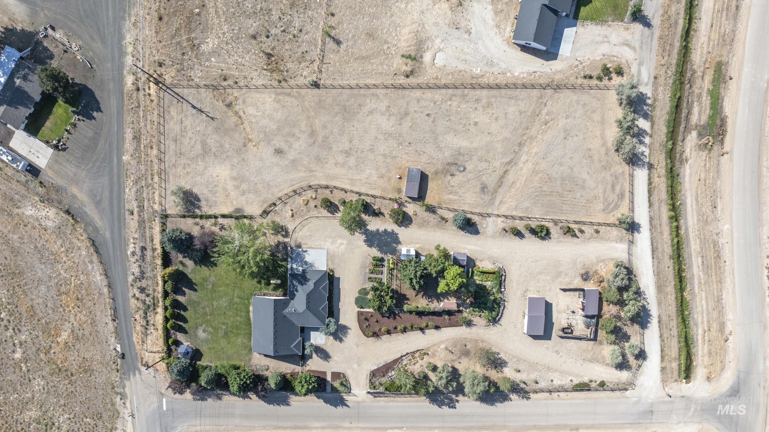 Aerial view of property and surrounding area with rural landscape
