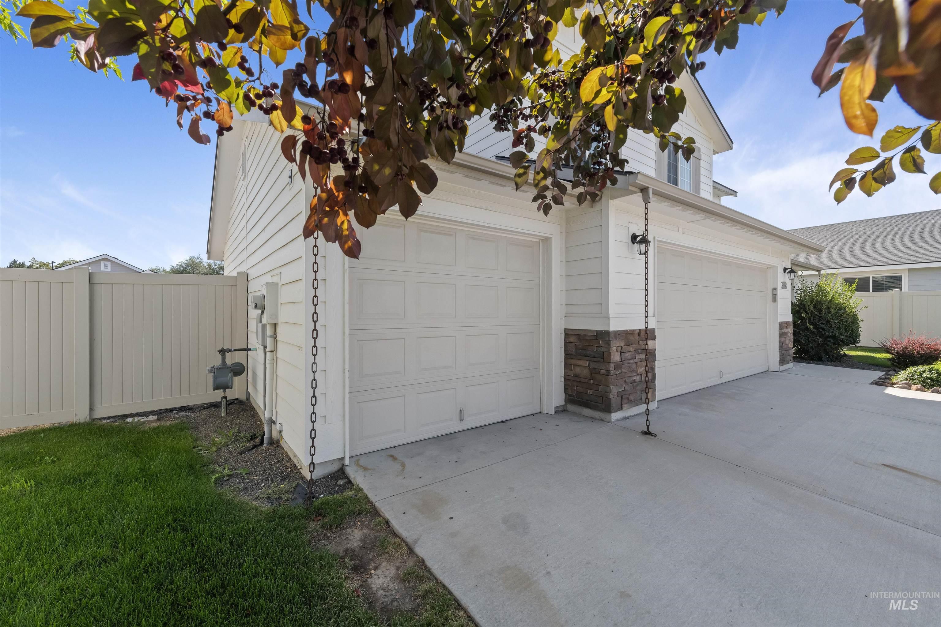 Garage with concrete driveway