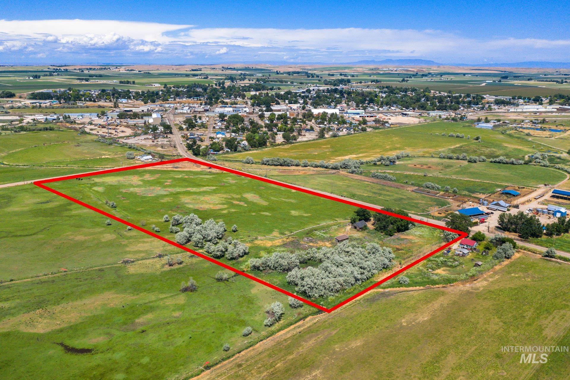 Aerial view of property's location with property boundaries highlighted and rural landscape