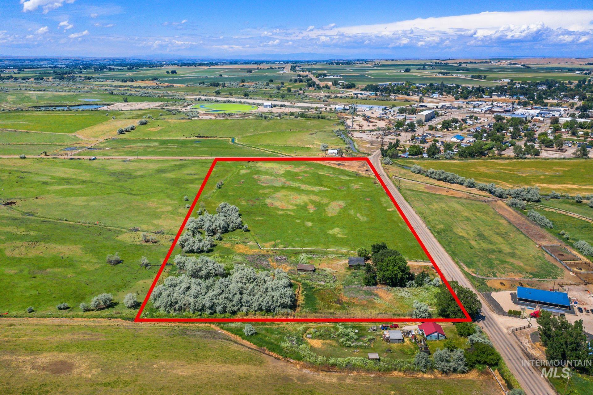 Aerial view of the area just annexed featuring property parcel outlined