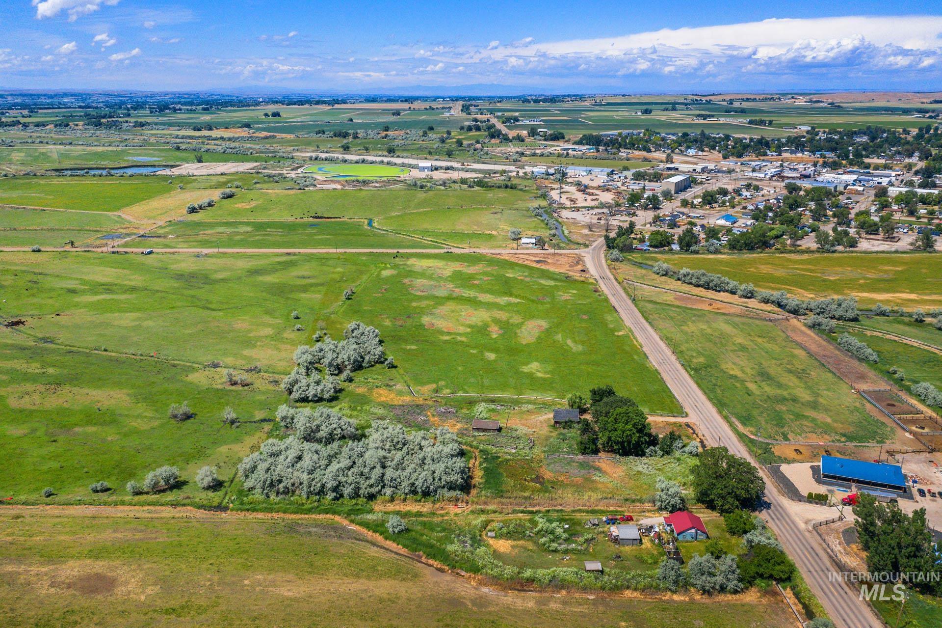 Aerial view of the C-2 commercial property and surrounding area with rural landscape