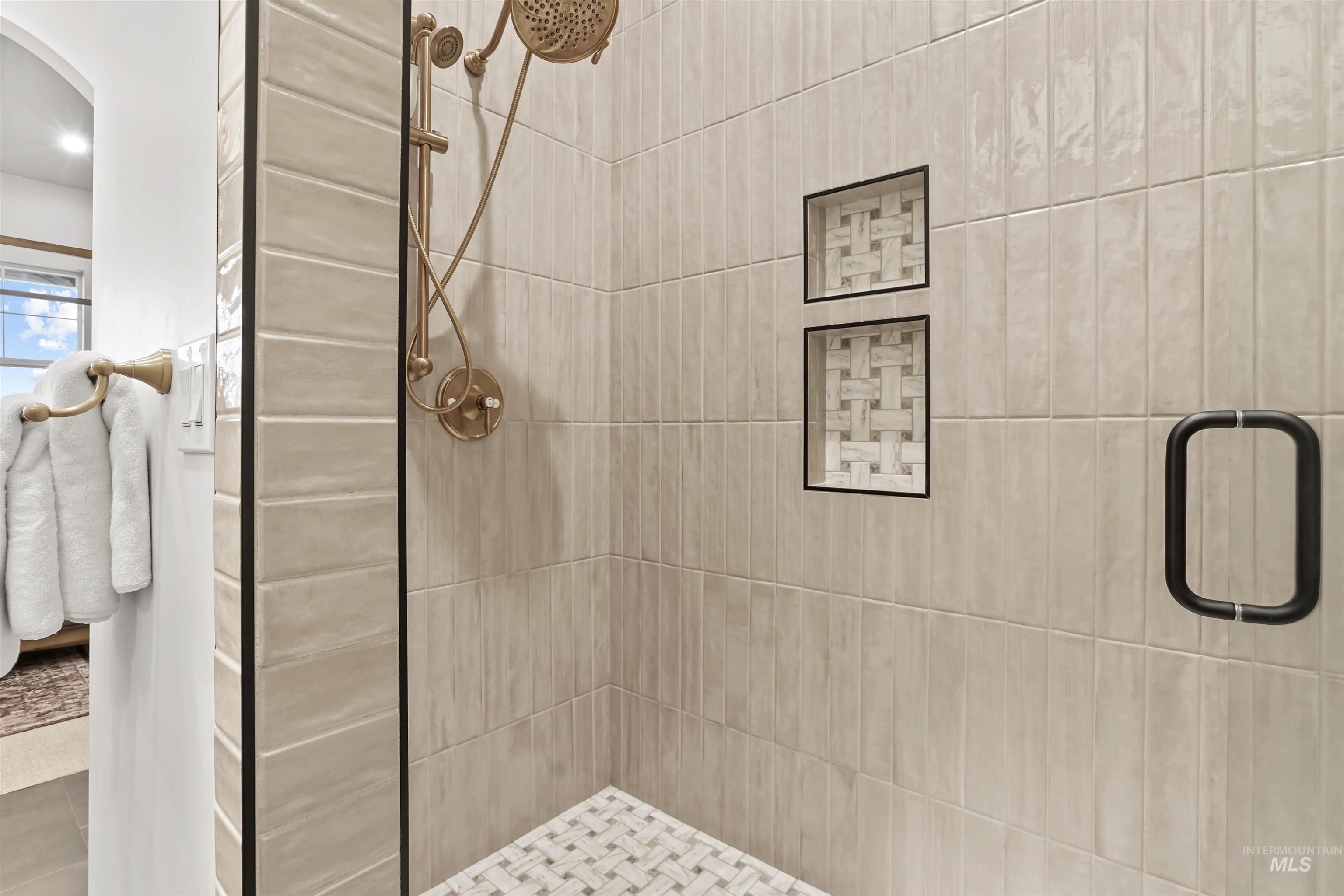Full bathroom with a stall shower