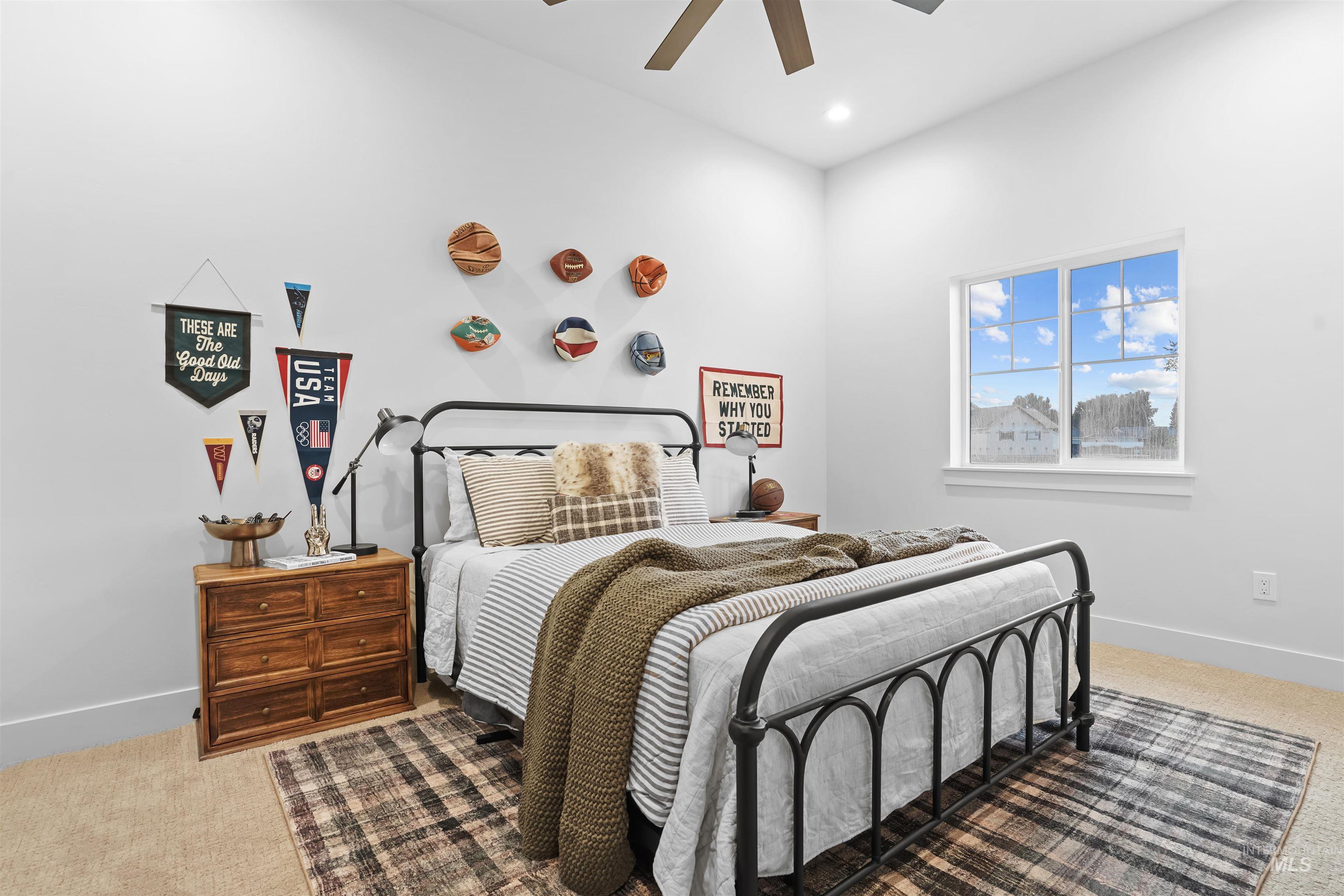 Bedroom featuring carpet flooring, a ceiling fan, and recessed lighting