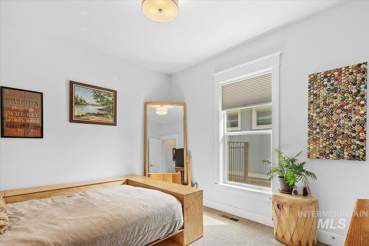 Bedroom featuring baseboards