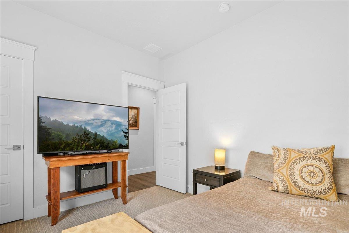 Bedroom featuring baseboards
