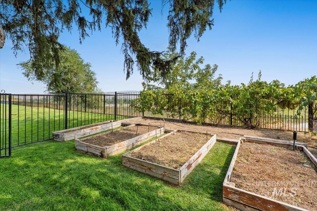 View of yard featuring a vegetable garden