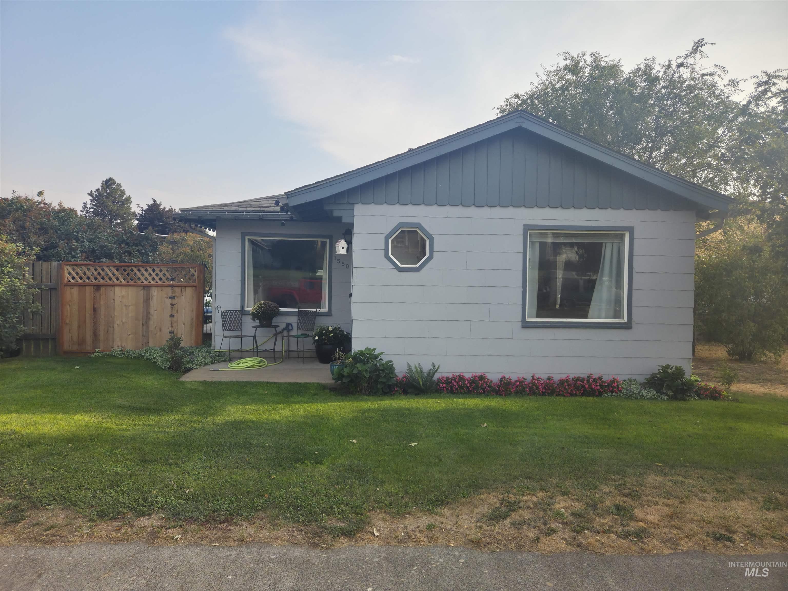 View of front of home with a patio