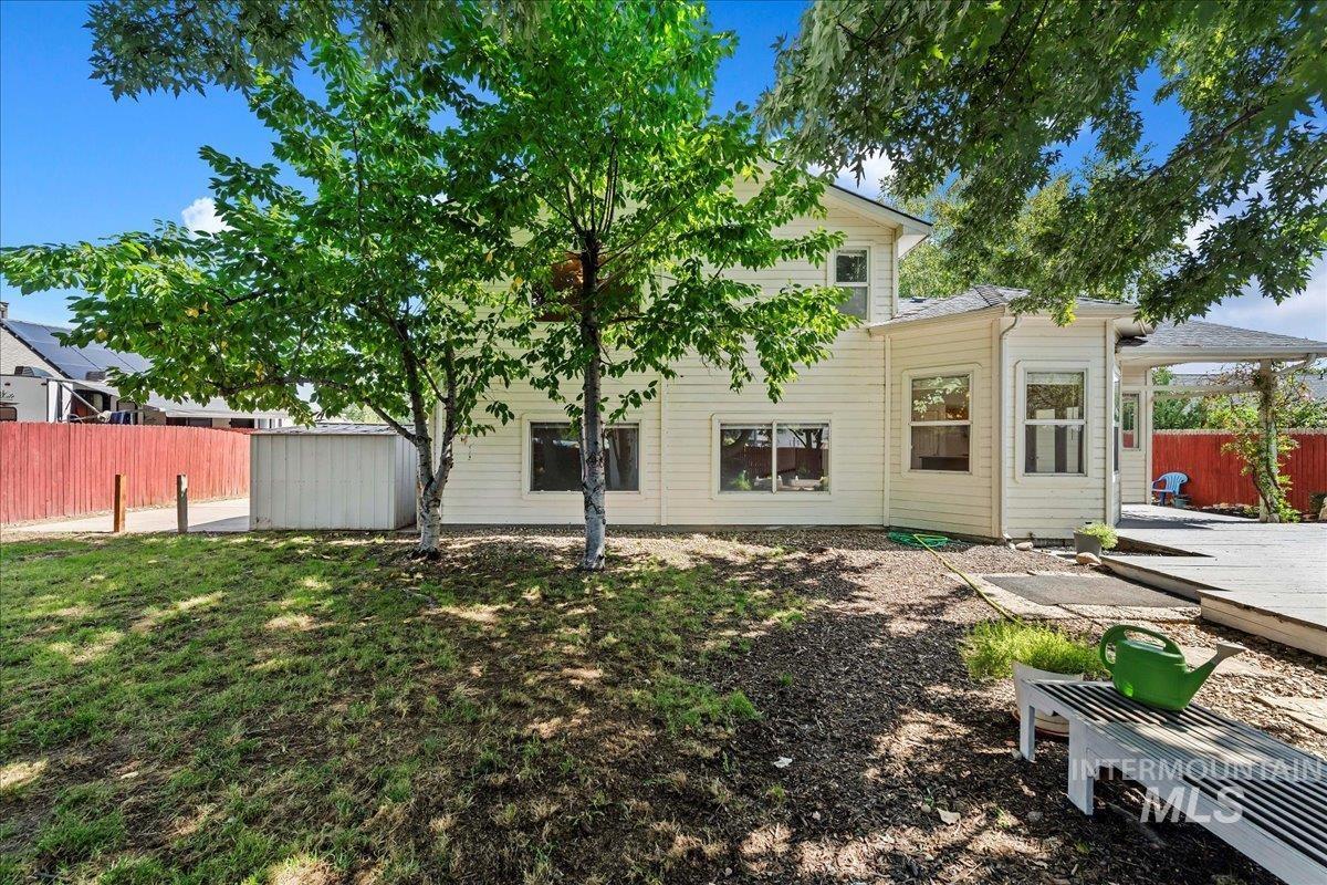 Rear view of property with a patio area