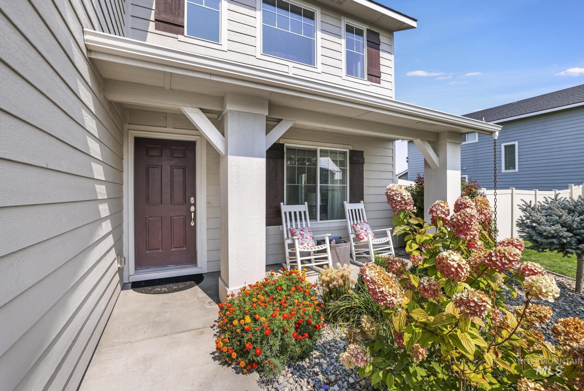 Doorway to property with covered porch