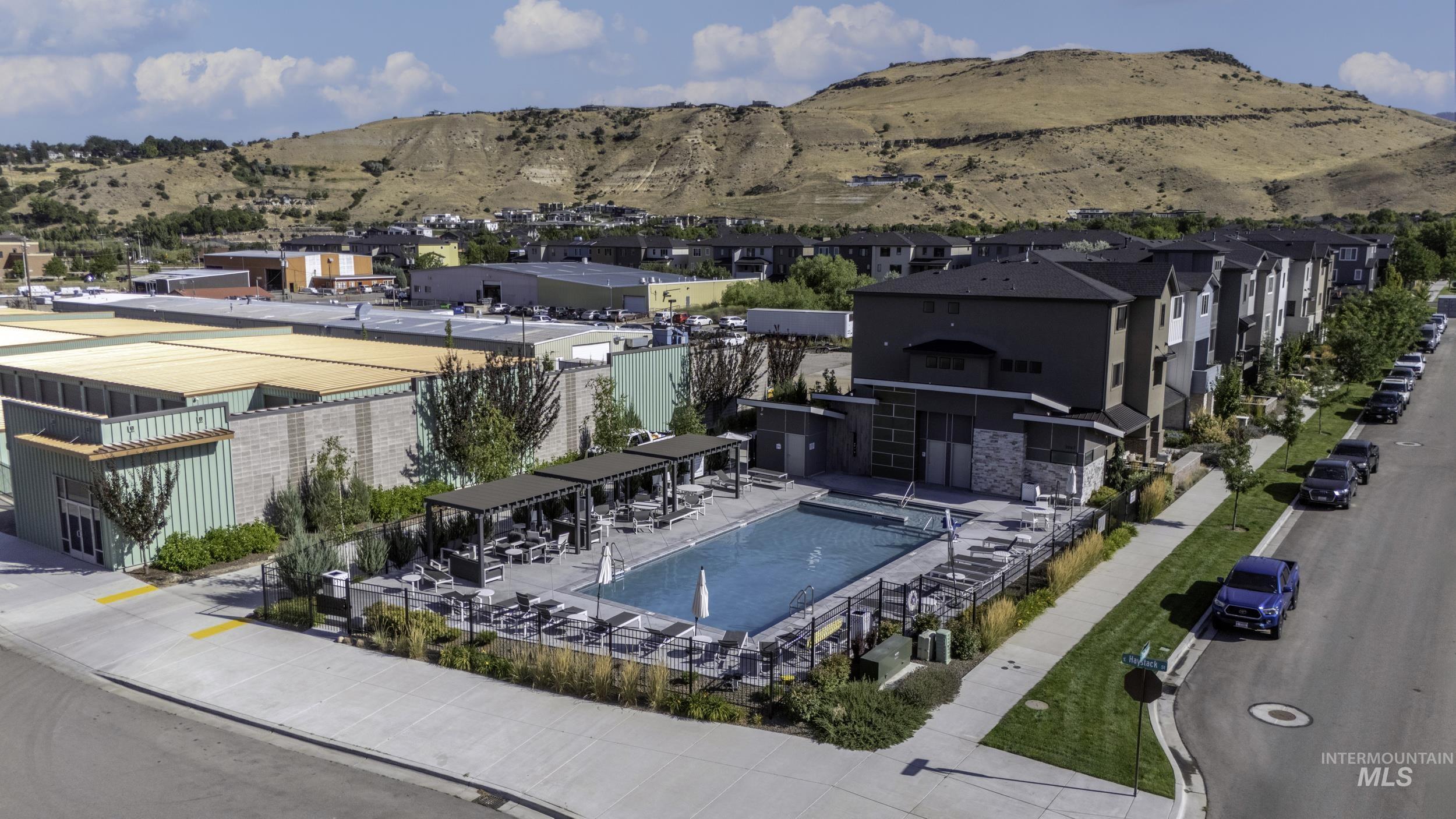 View of pool featuring a mountain view and a residential view