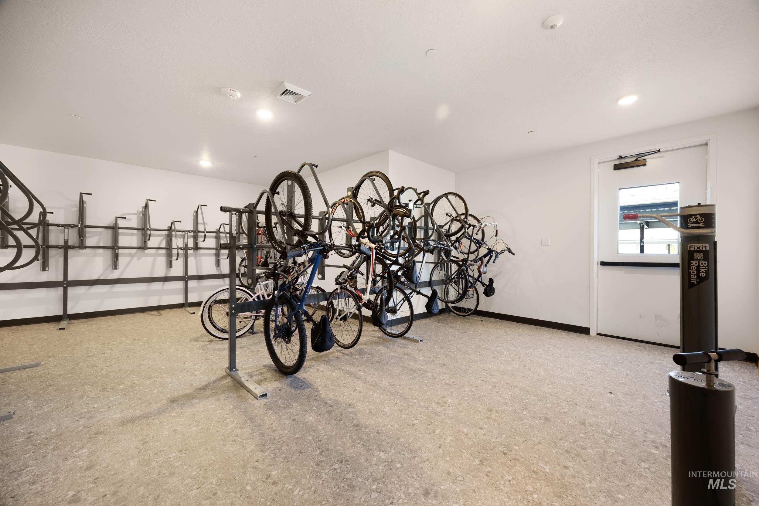 Garage featuring bike storage and recessed lighting
