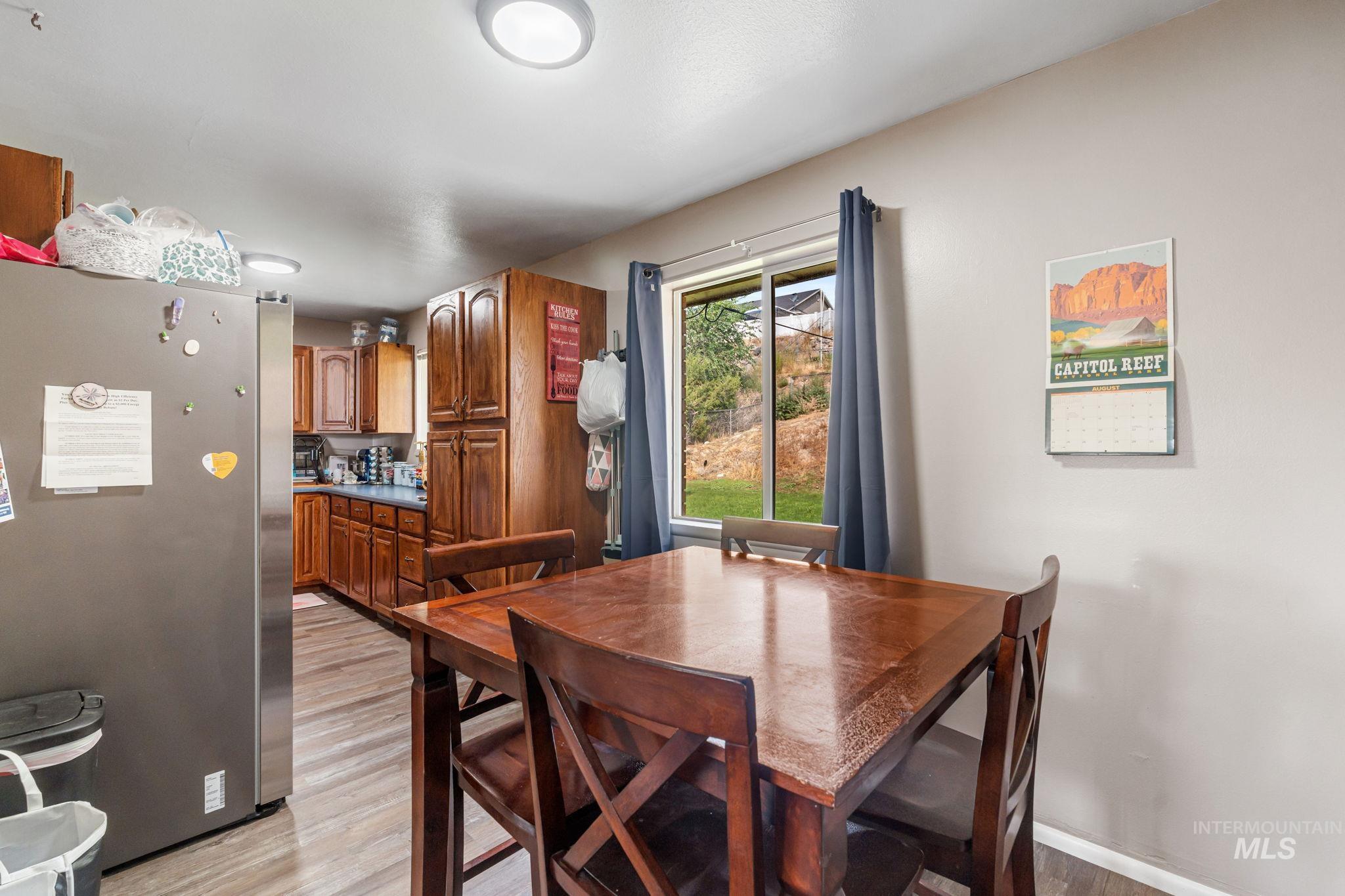 Dining space featuring light wood-type flooring