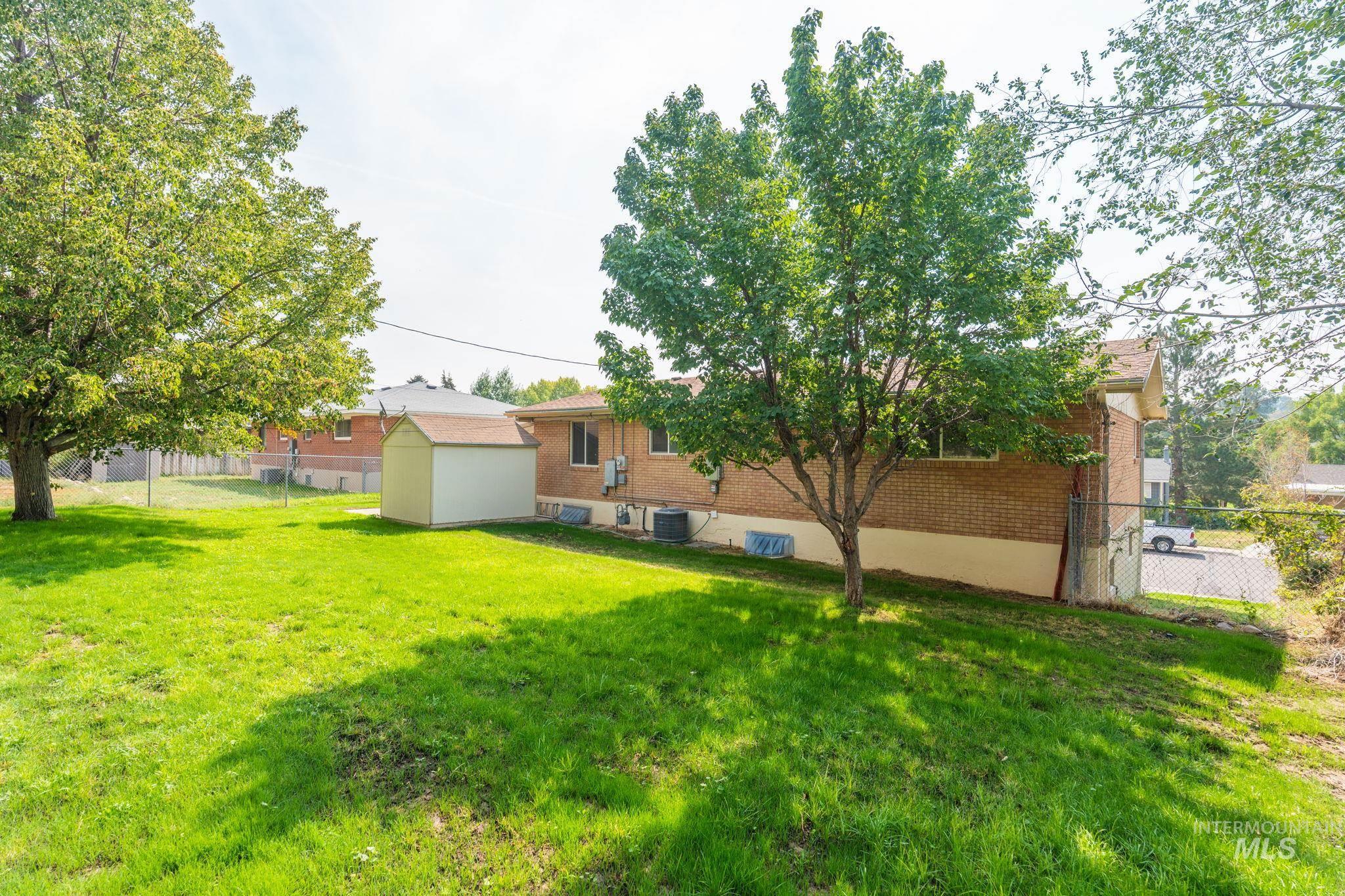 View of yard with an outbuilding