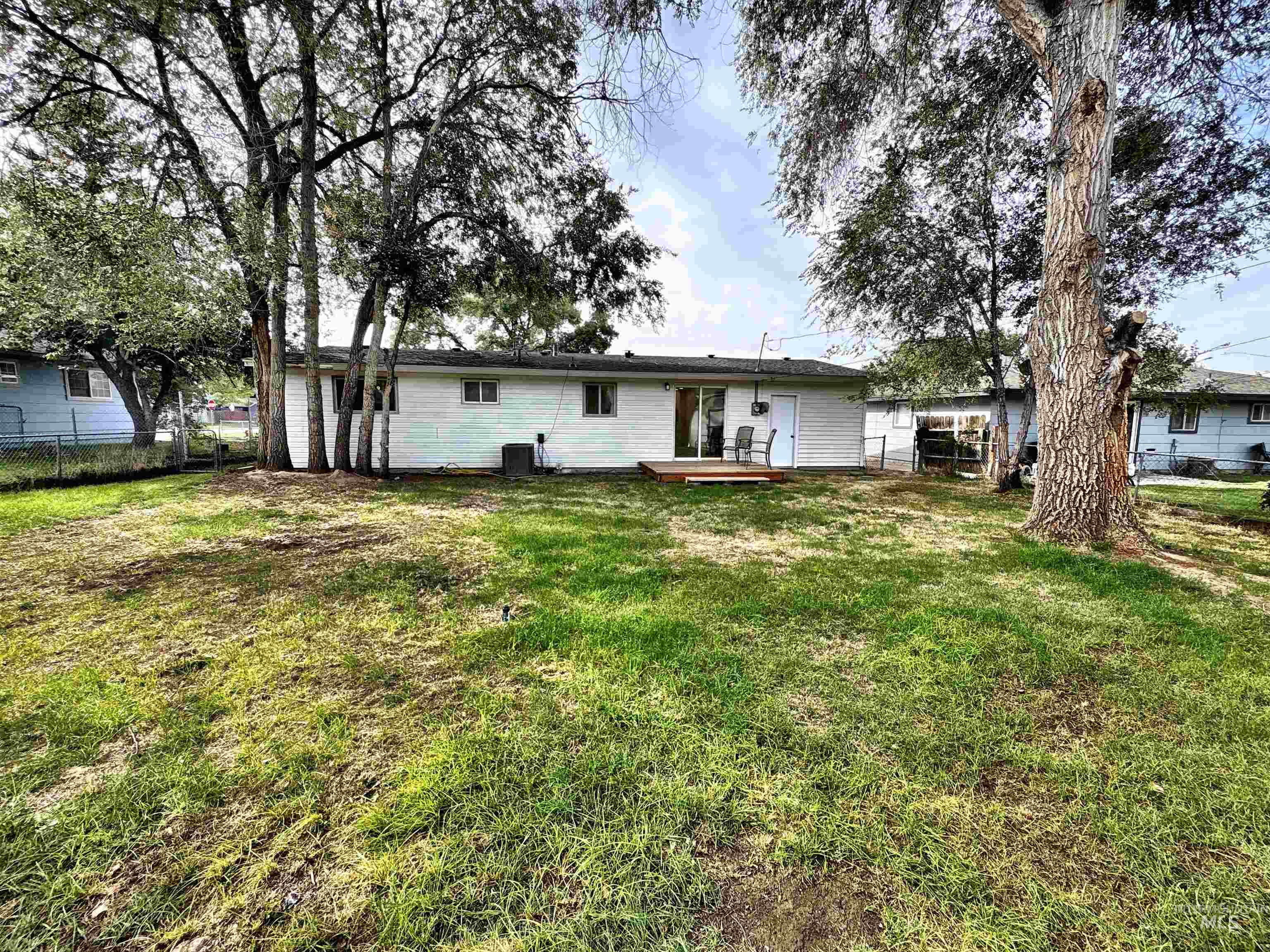 Back of property with a patio area