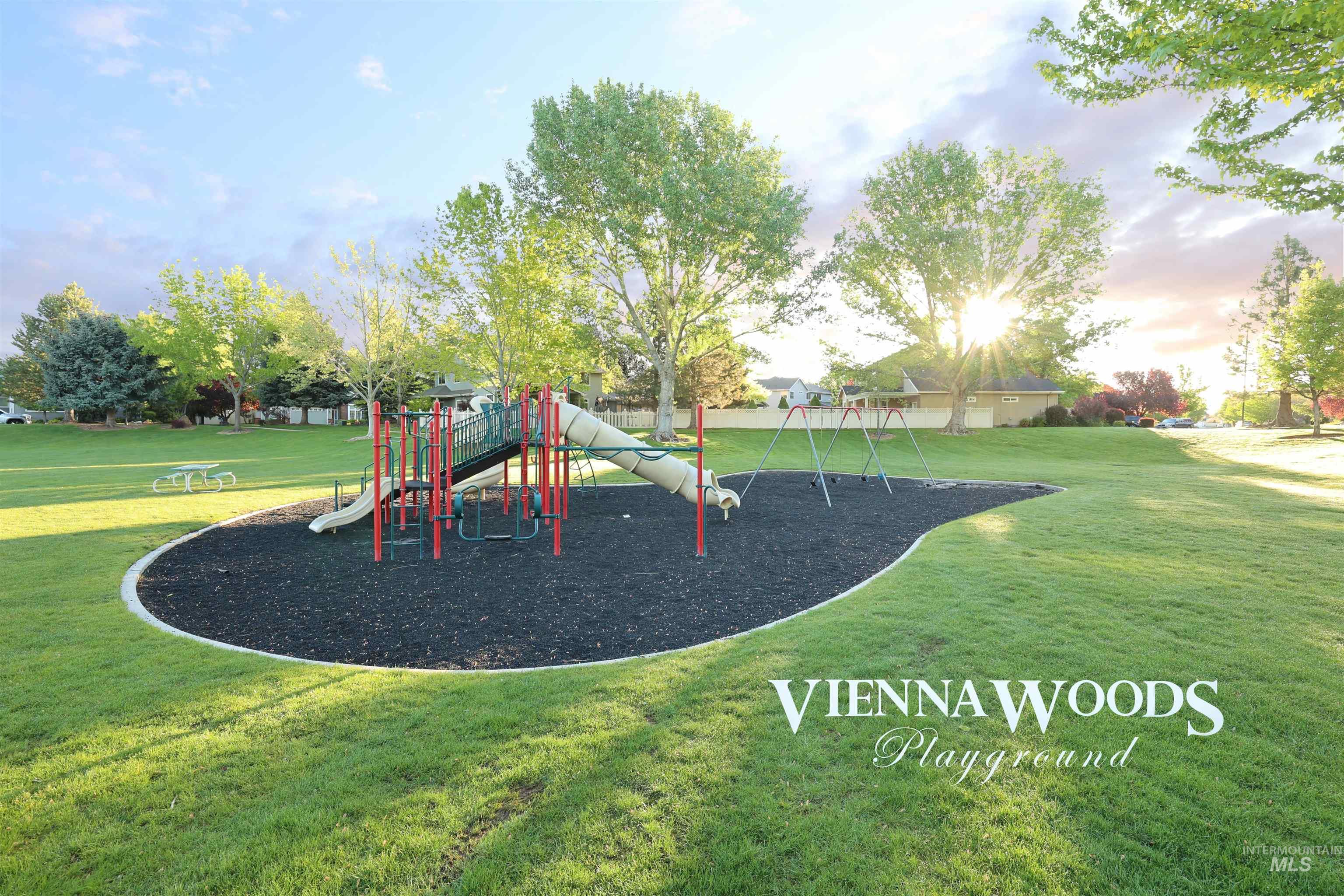 Communal playground featuring a yard