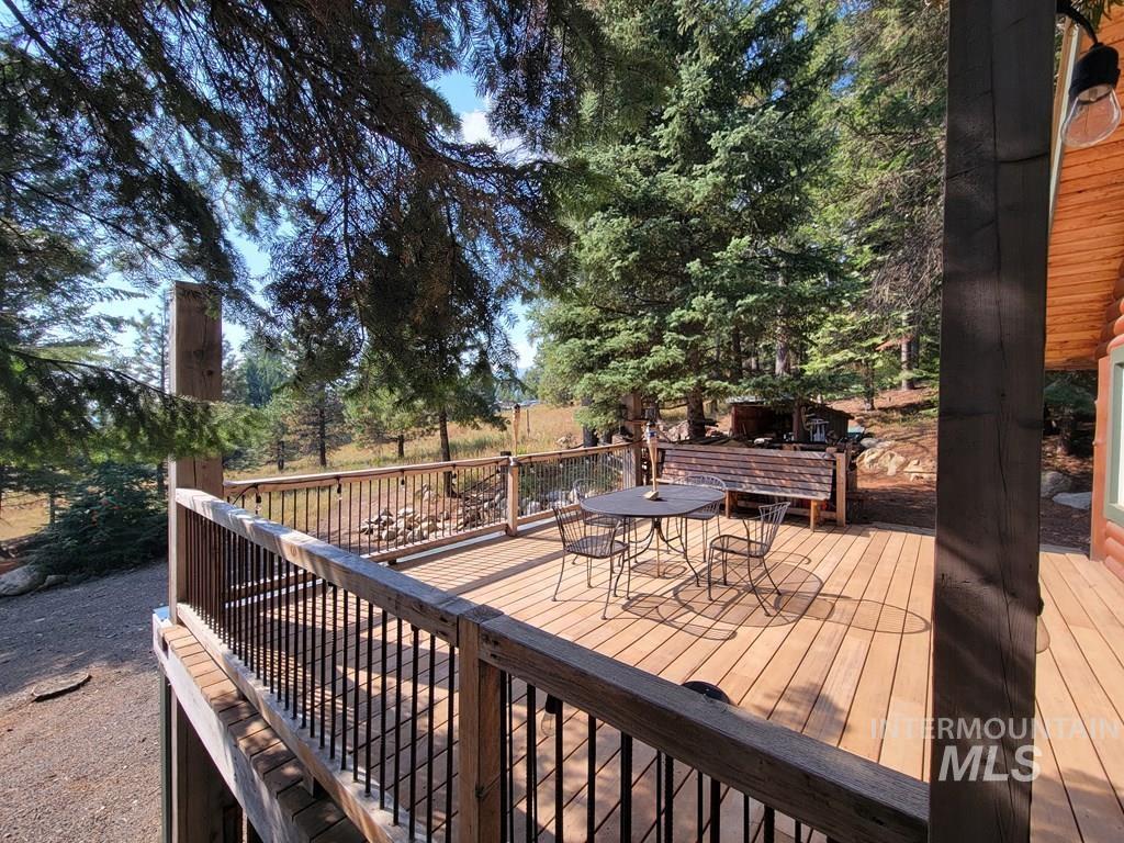 Wooden terrace with outdoor dining area