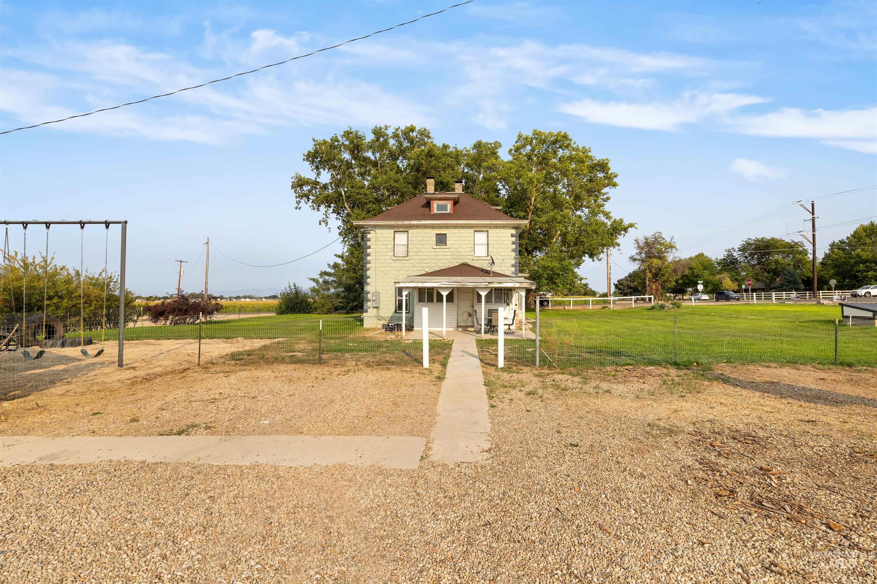 View of front of house with covered porch