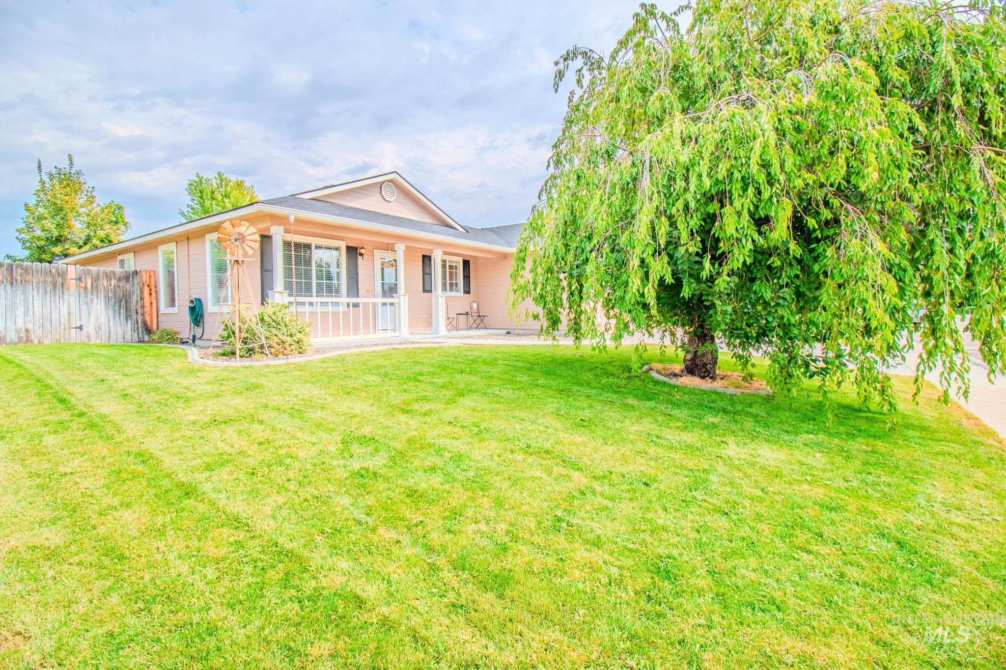 Rear view of property with a porch