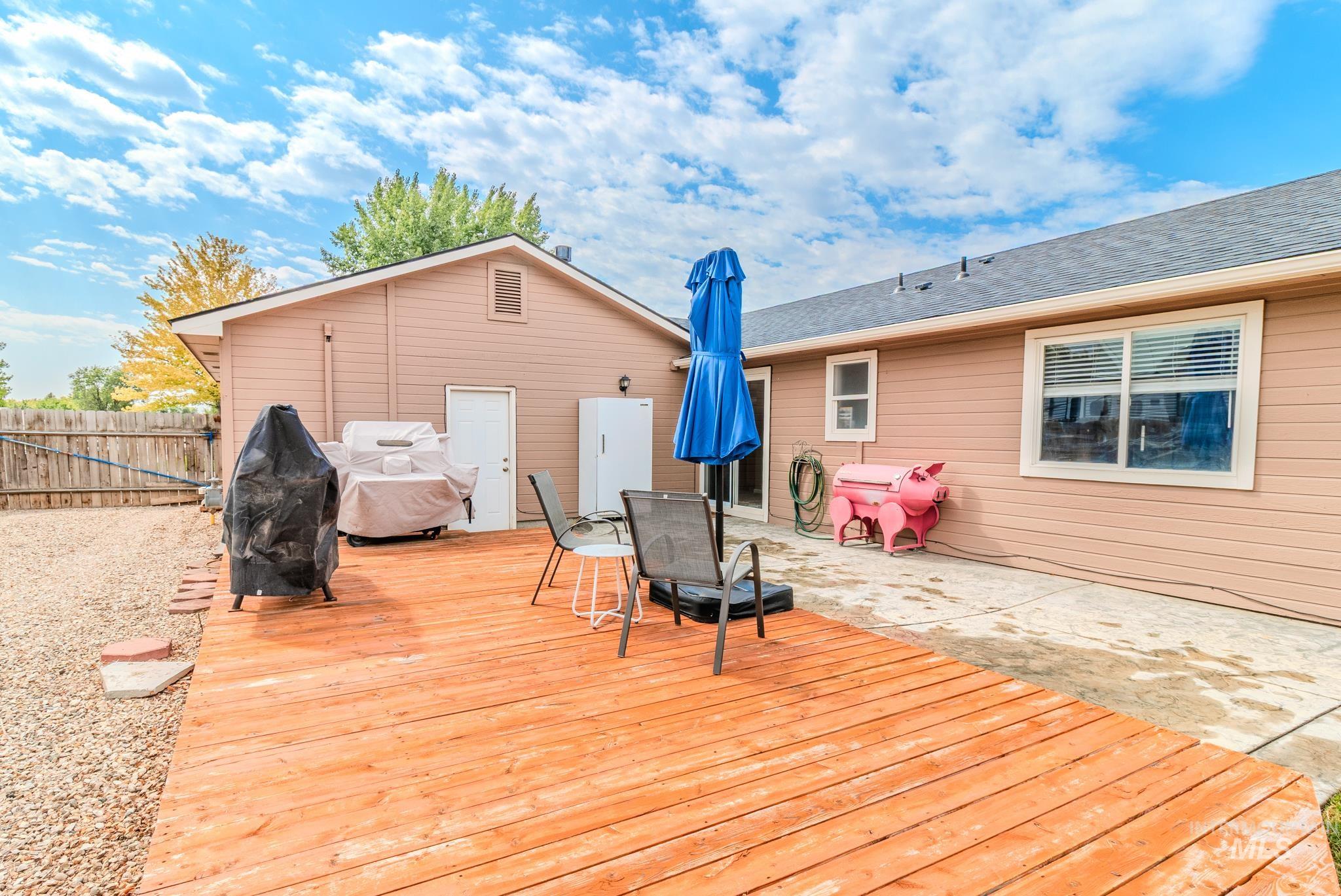 Deck with a patio and area for grilling