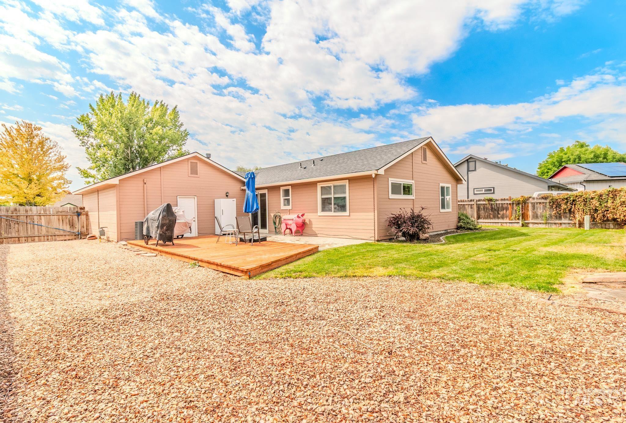 Rear view of property with a deck