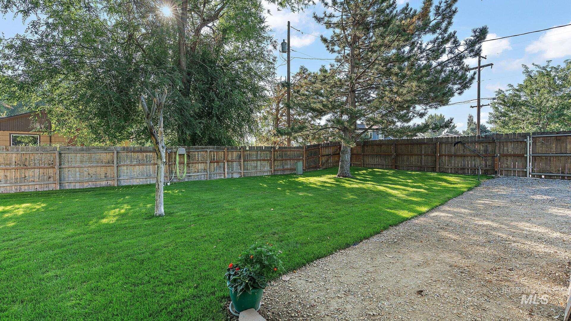 View of fenced backyard